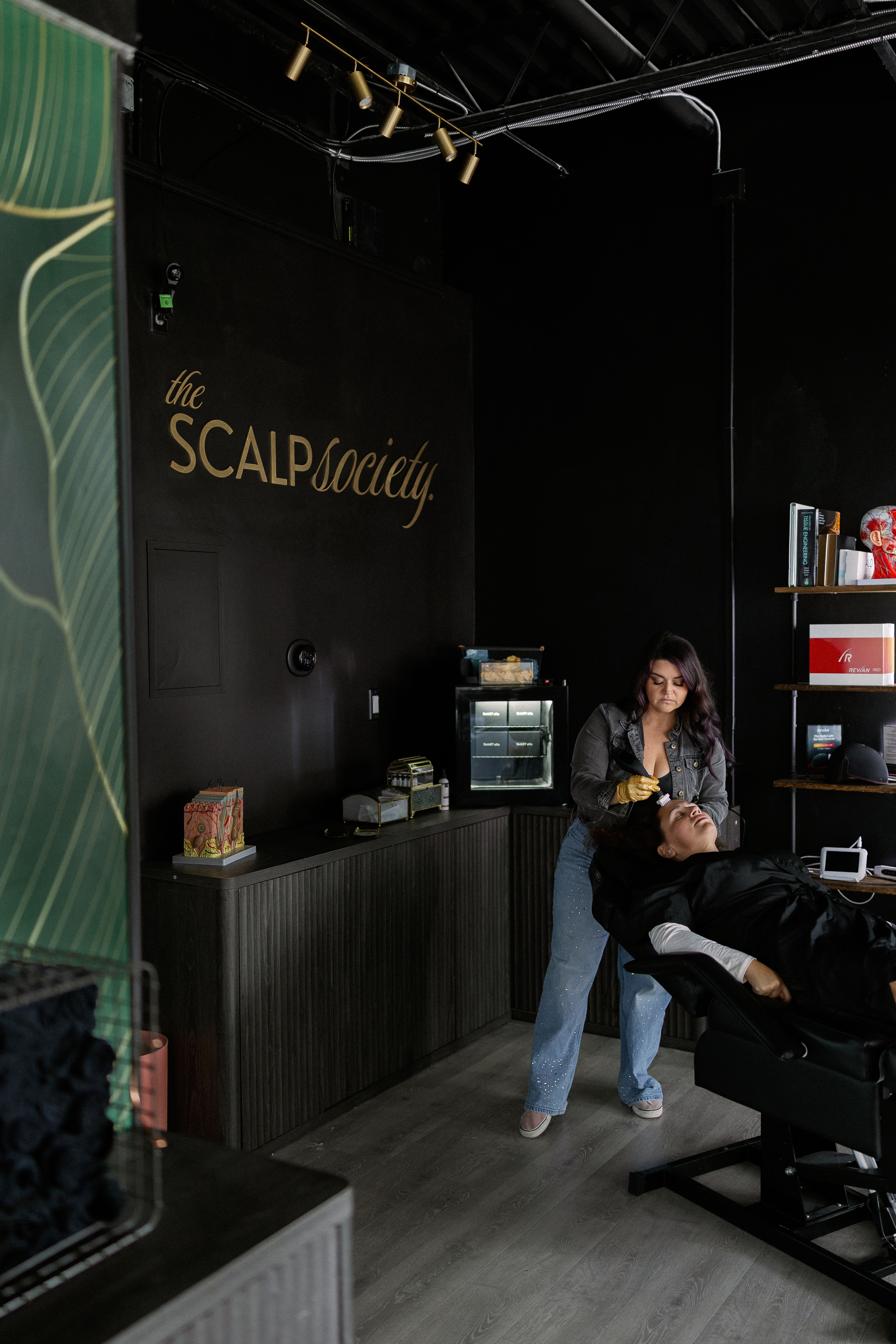 The Scalp Society studio in Key West, Florida — Carie Blush performing scalp therapy treatment